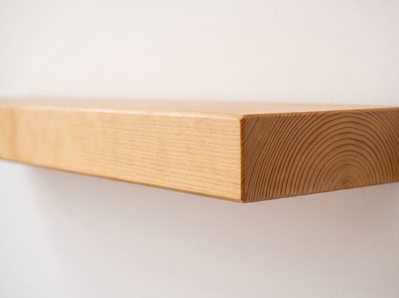 Side profile of a modern planed shelf with crisp square edges